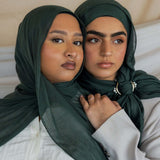 Two Models wearing breathable modal hijab that brings quiet depth and richness to any outfit.