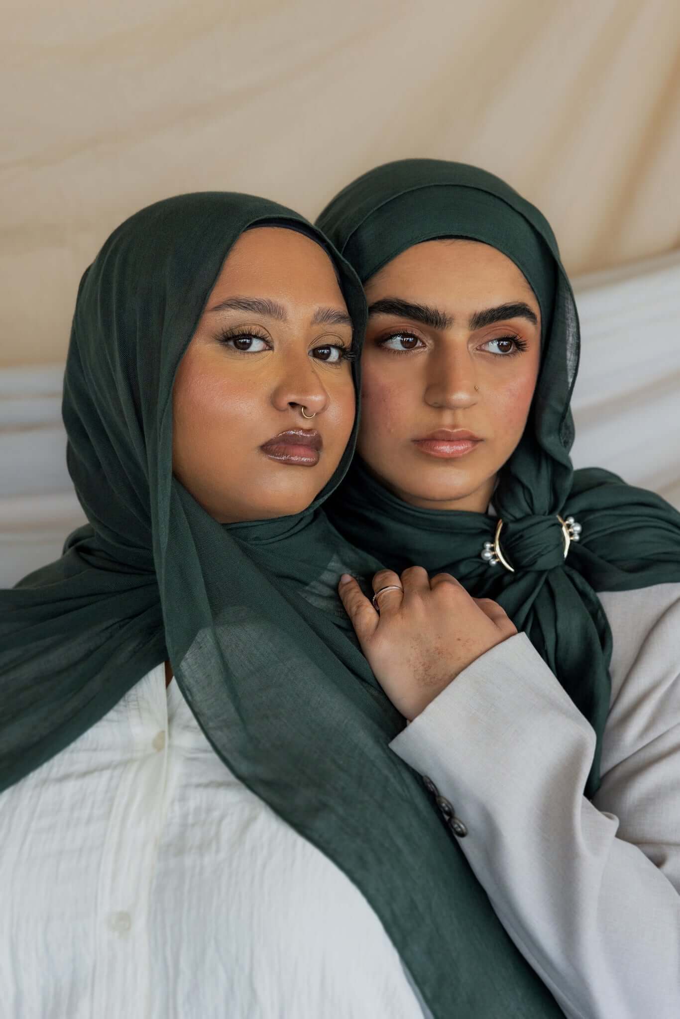 Two Models wearing breathable modal hijab that brings quiet depth and richness to any outfit.