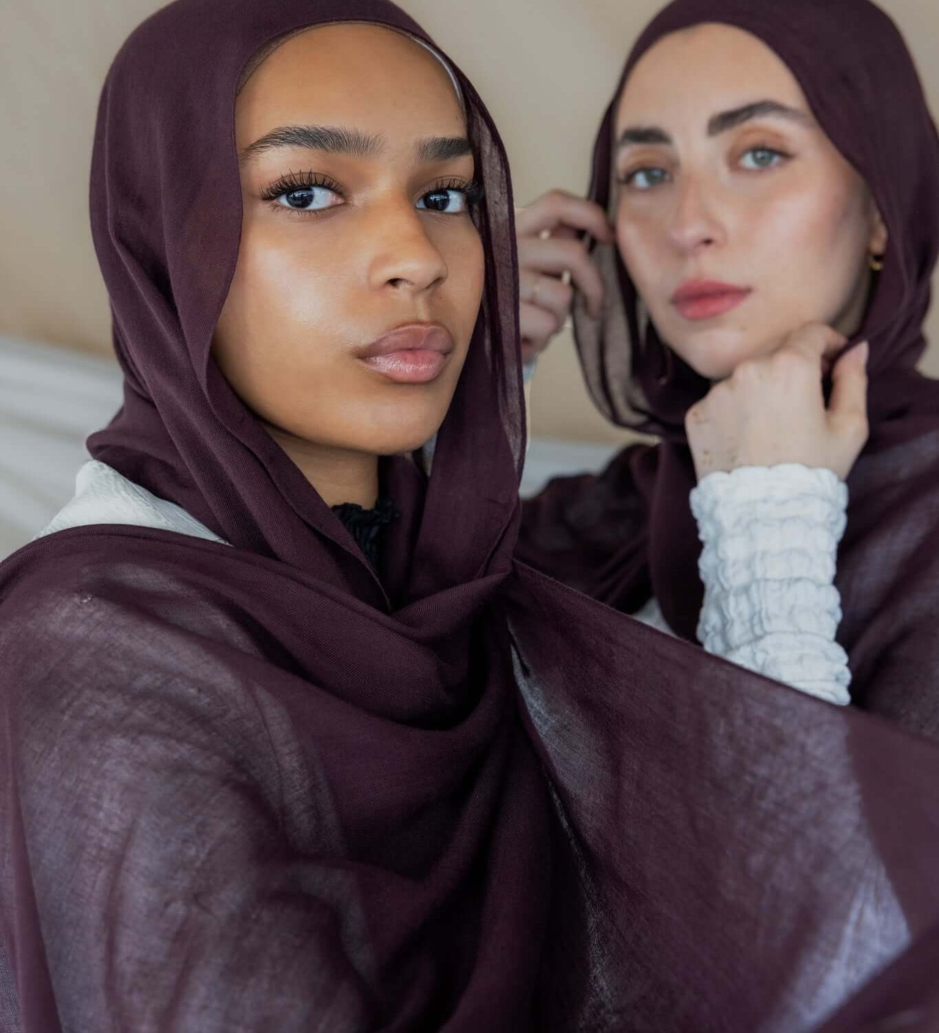 Two Models wearing breathable hijab with a bold, refined finish and elegant texture.