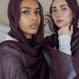 Two Models wearing breathable hijab with a bold, refined finish and elegant texture.