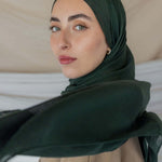 Model wearing soft modal hijab with a deep, earthy tone and smooth, breathable texture