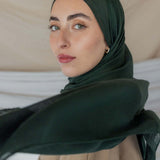 Model wearing soft modal hijab with a deep, earthy tone and smooth, breathable texture
