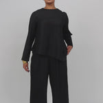 Textured pleated top with an easy fit and gentle drape for everyday wear