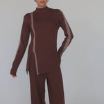 Model styled with brown matching set with truffle stripe.