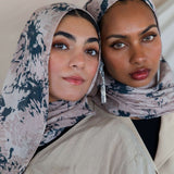 Modal hijab with an abstract camo-inspired print and soft, breathable feel.