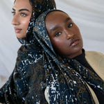 Modal hijab featuring a moody abstract design with organic movement and texture.