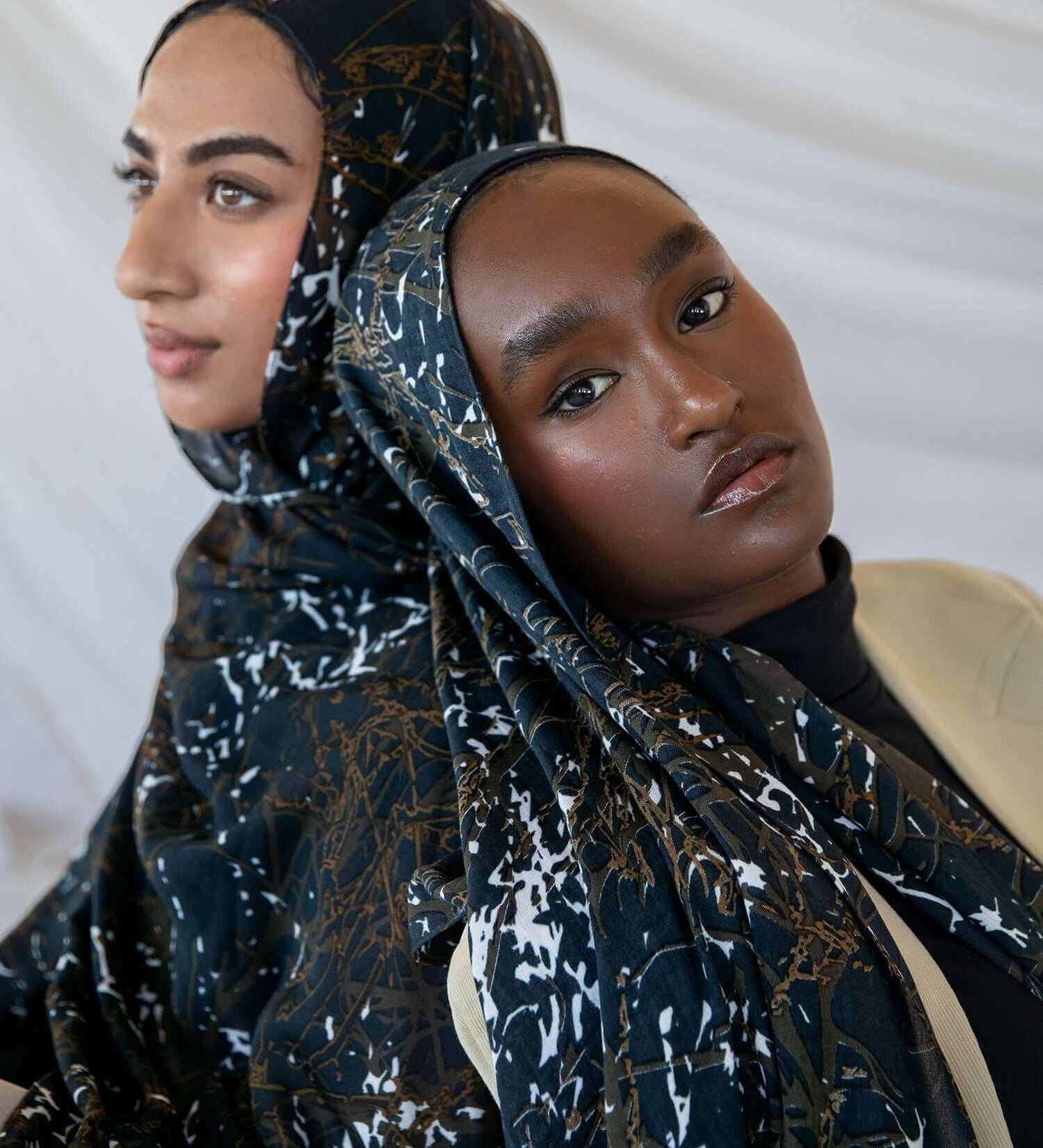 Modal hijab featuring a moody abstract design with organic movement and texture.