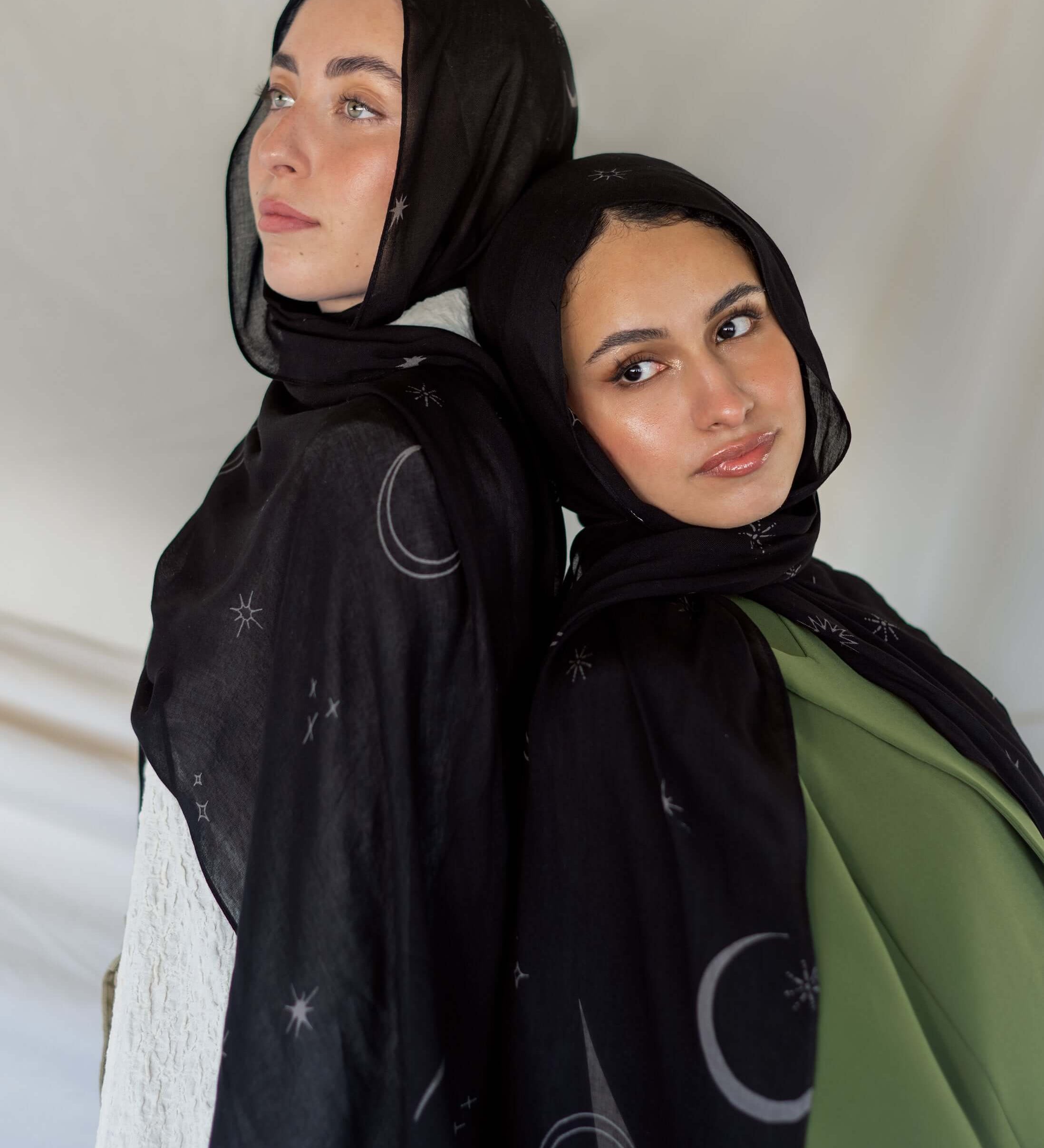 Woven modal hijab with moon and star print, inspired by peaceful night skies.