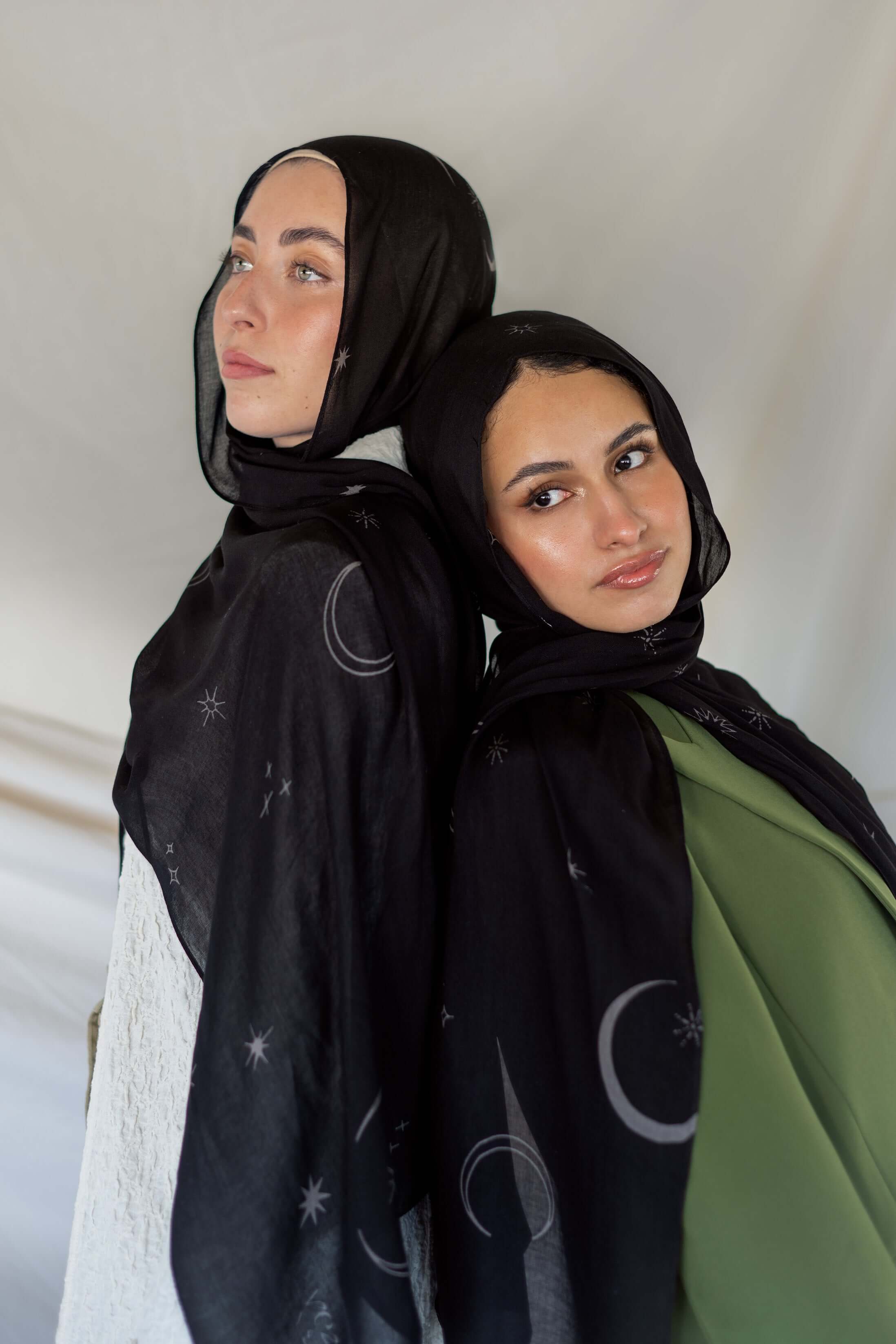 Woven modal hijab with moon and star print, inspired by peaceful night skies.