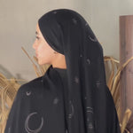 Ramadan-inspired hijab featuring a night sky print on breathable woven modal.