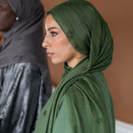 Celestial print hijab featuring lunar and star motifs on soft, breathable fabric.