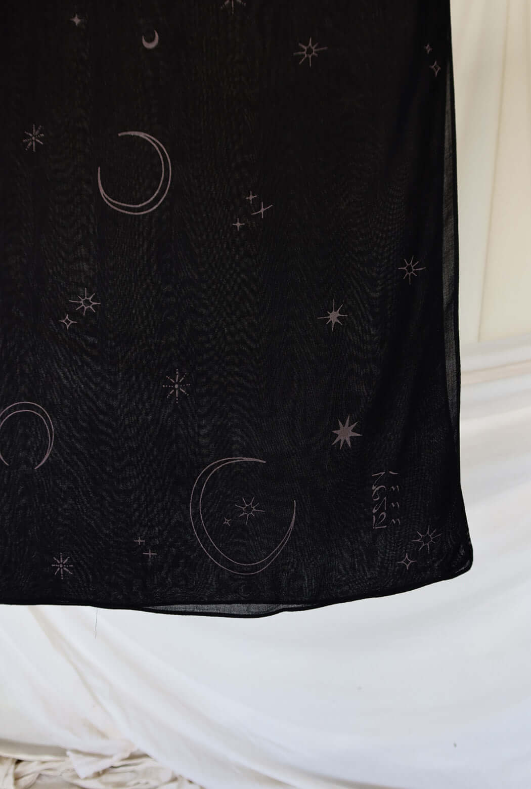 Lightweight hijab with moon and star accents, designed for evening elegance