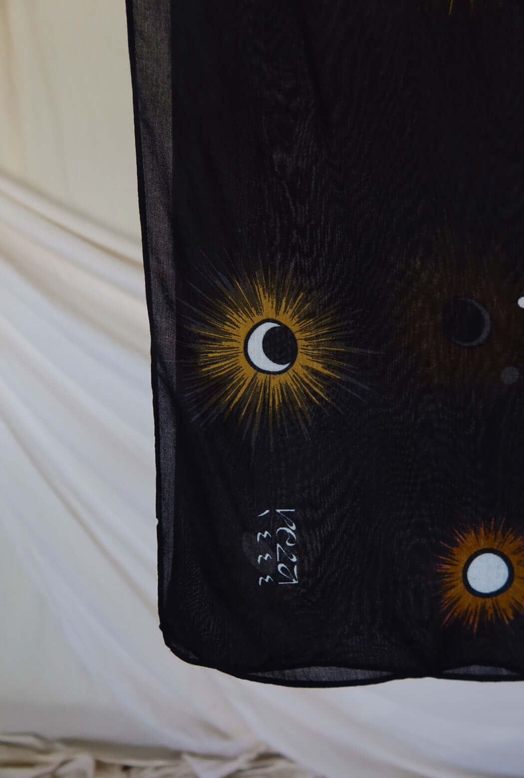 Hijab with moon phases print, capturing the spirit of Qiyam nights and spiritual reflection