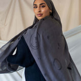 Elegant modal hijab featuring scattered moons and stars for a softly luminous look