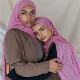Two Models wearing woven bamboo hijab with a soft, airy drape and natural lightweight texture