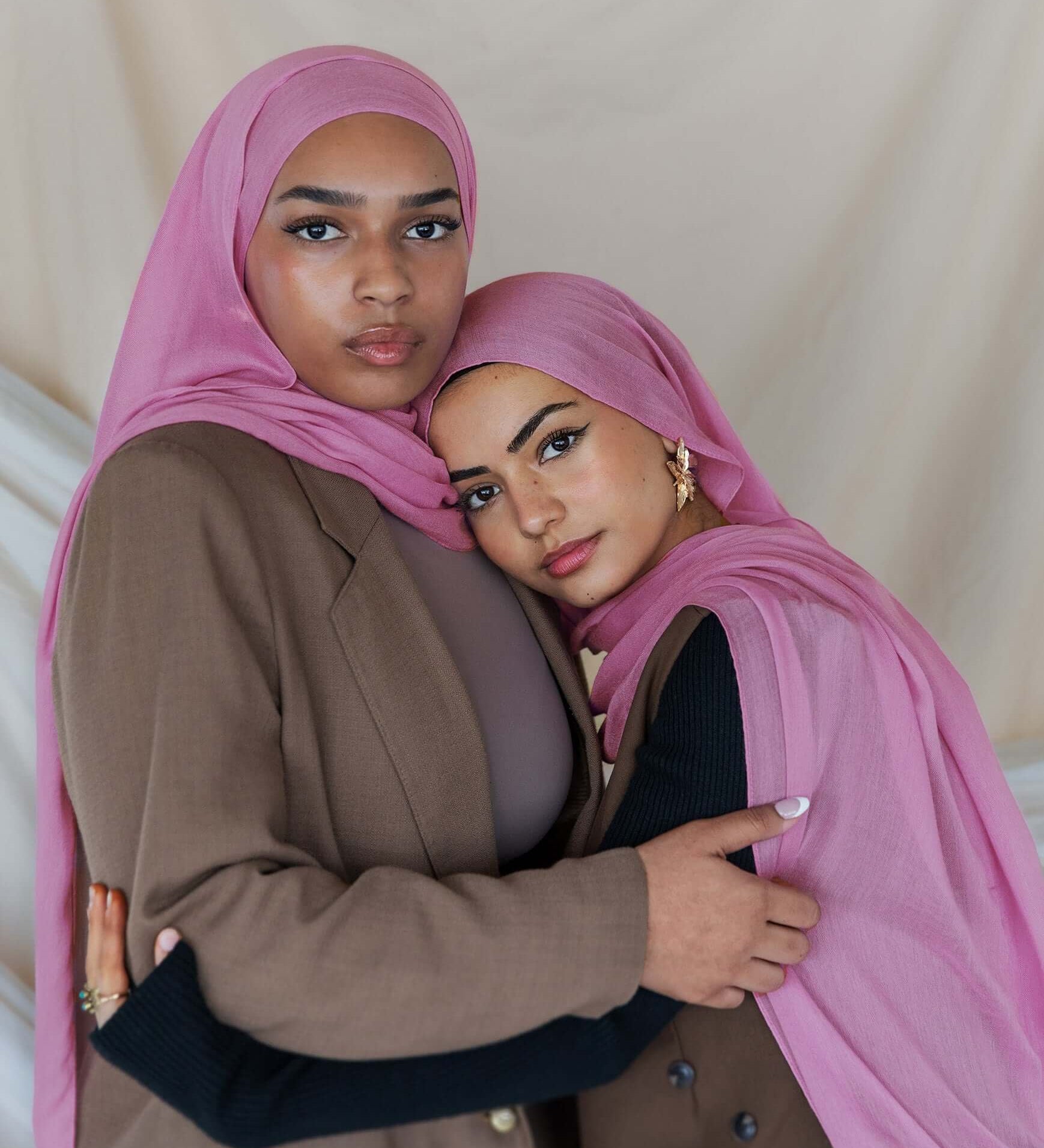 Two Models wearing woven bamboo hijab with a soft, airy drape and natural lightweight texture