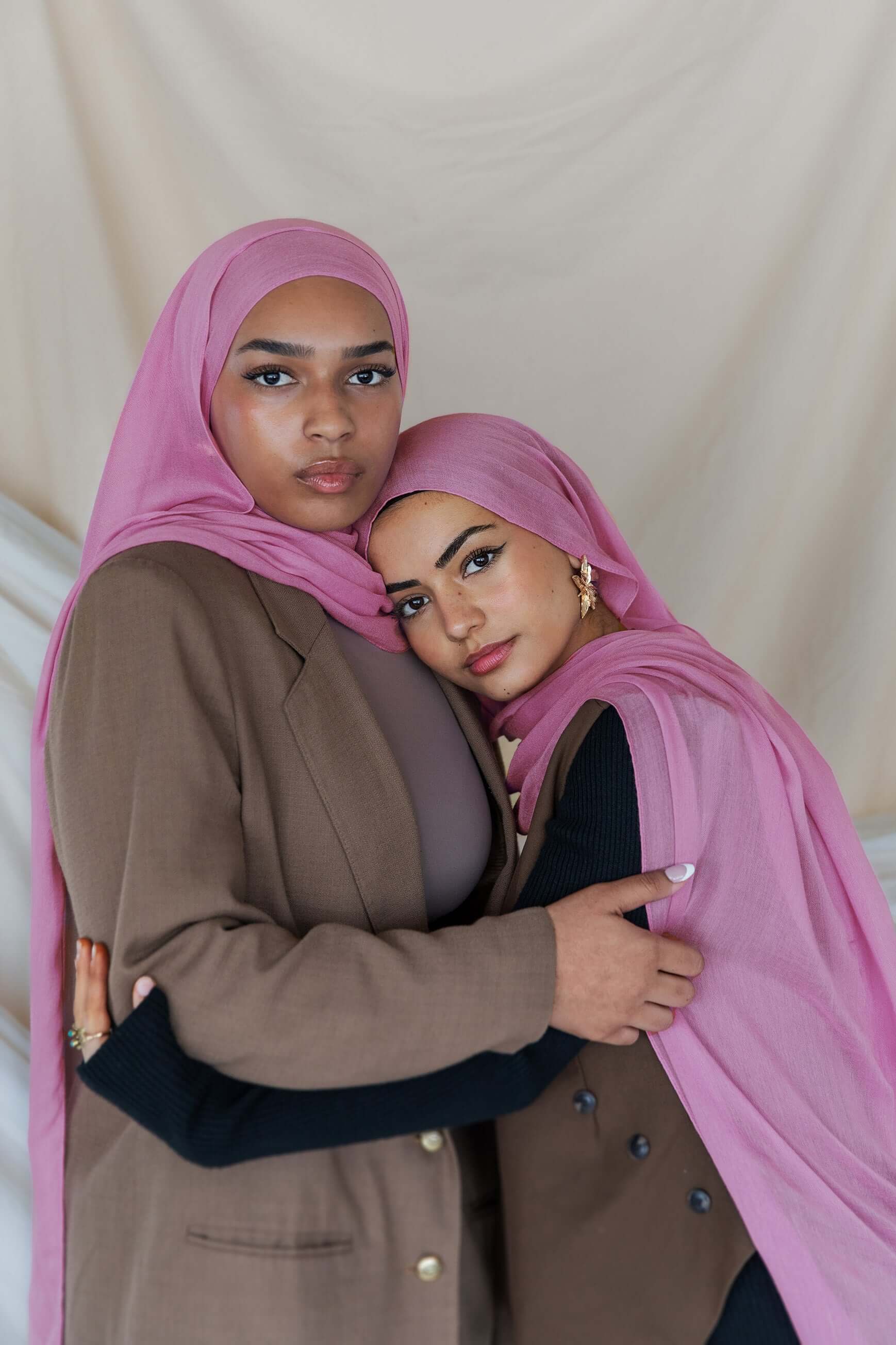 Two Models wearing woven bamboo hijab with a soft, airy drape and natural lightweight texture