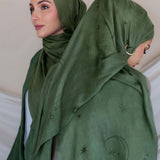 Woven modal hijab with star and moon print, inspired by peaceful Ramadan nights.