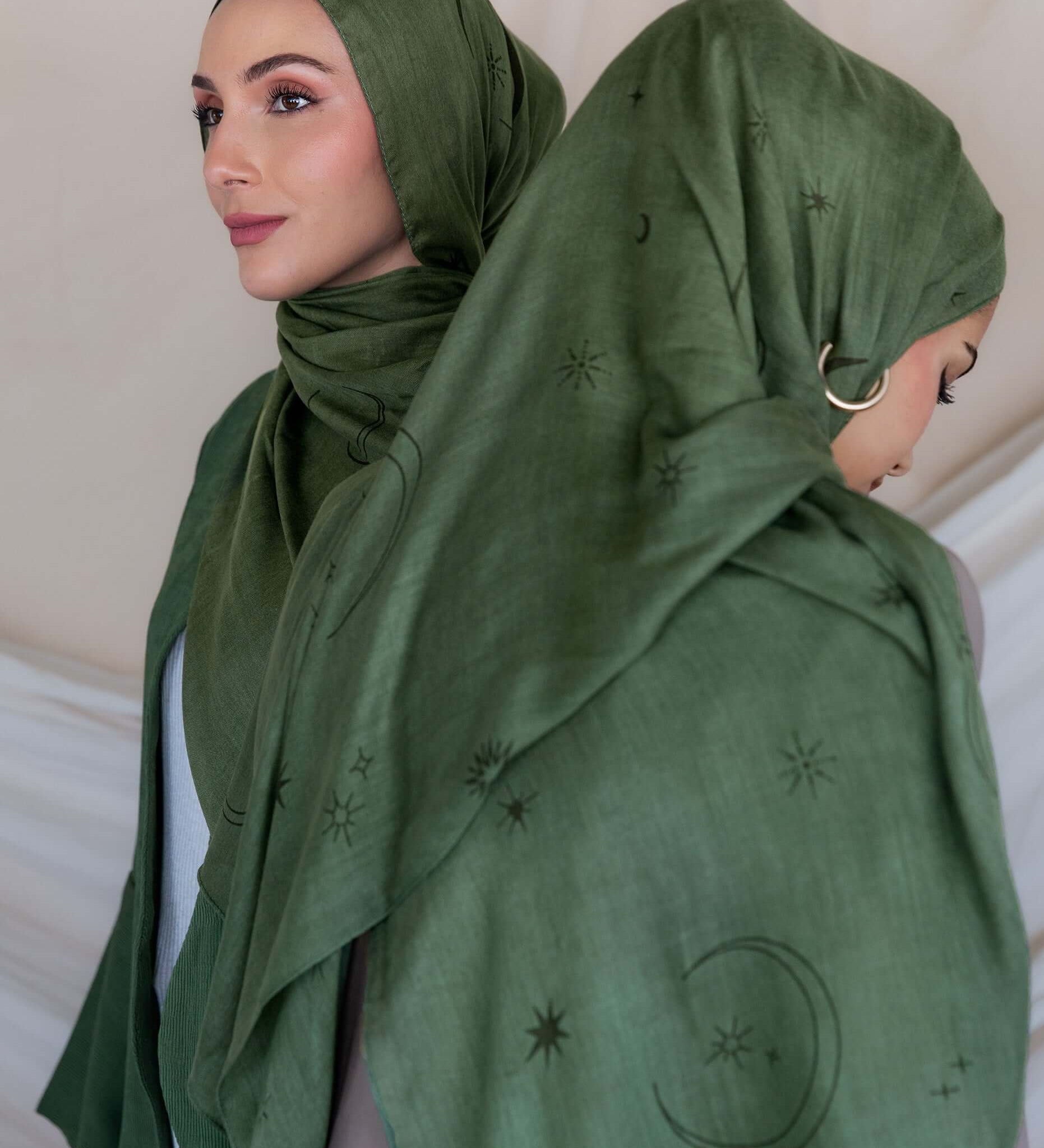 Woven modal hijab with star and moon print, inspired by peaceful Ramadan nights.