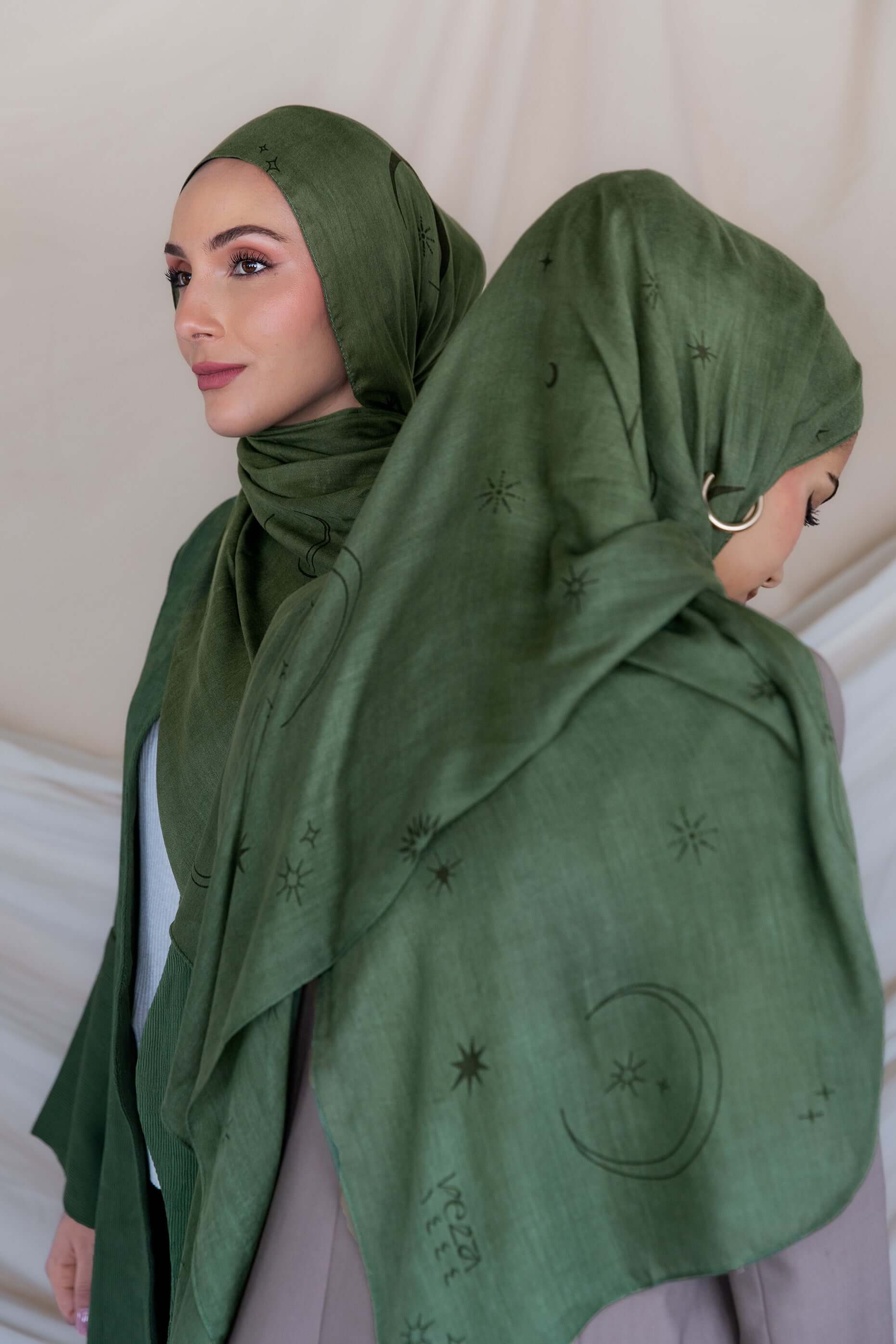 Woven modal hijab with star and moon print, inspired by peaceful Ramadan nights.