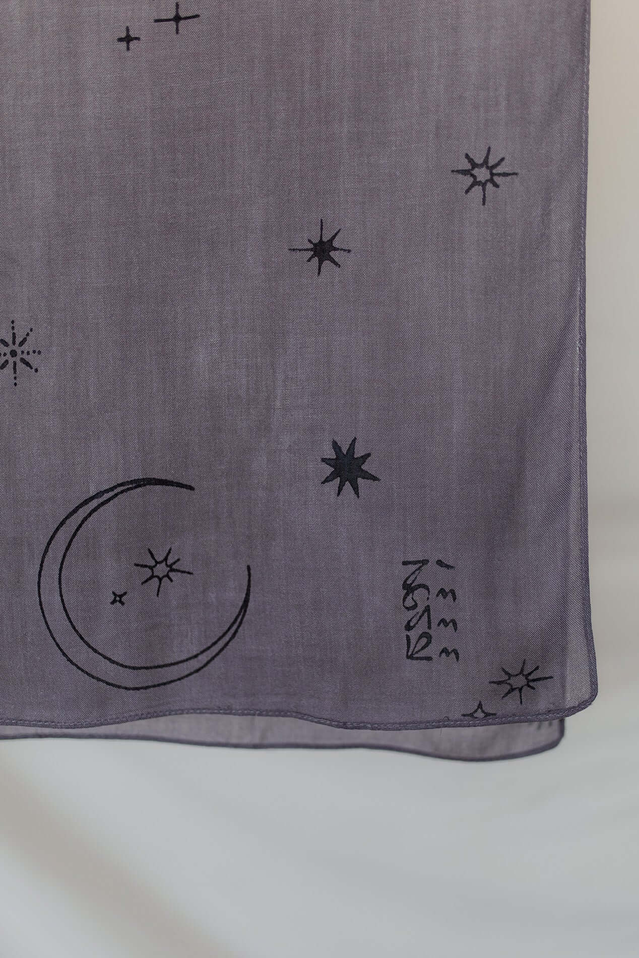Soft modal hijab with delicate star and moon detailing, perfect for special occasions