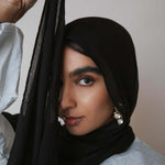 VELA Classic Black hijab in signature modal fabric, offering timeless style and everyday comfort.