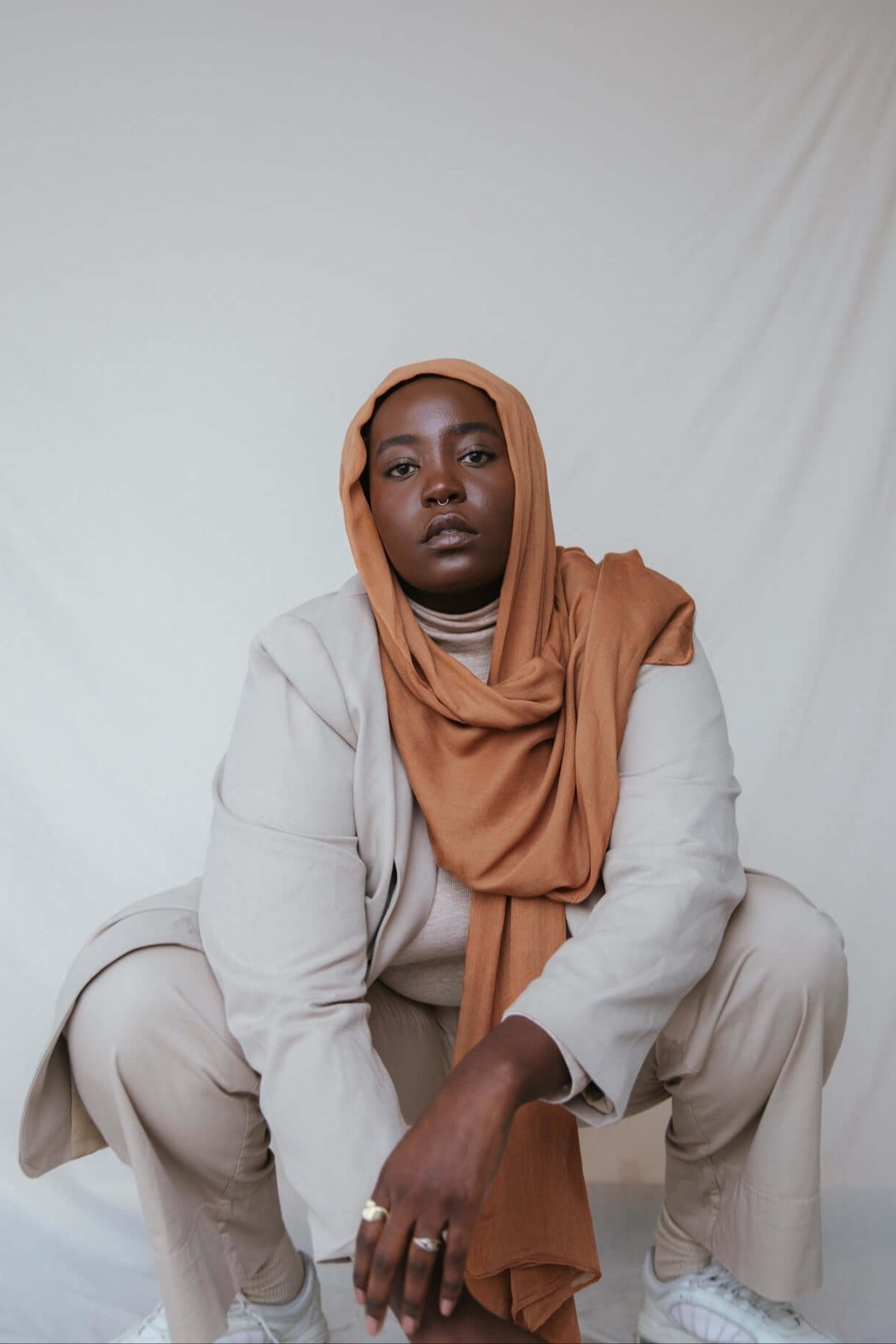 A rich, spiced hijab in Cinnamon, crafted from VELA’s ultra-soft modal for timeless, layered styling