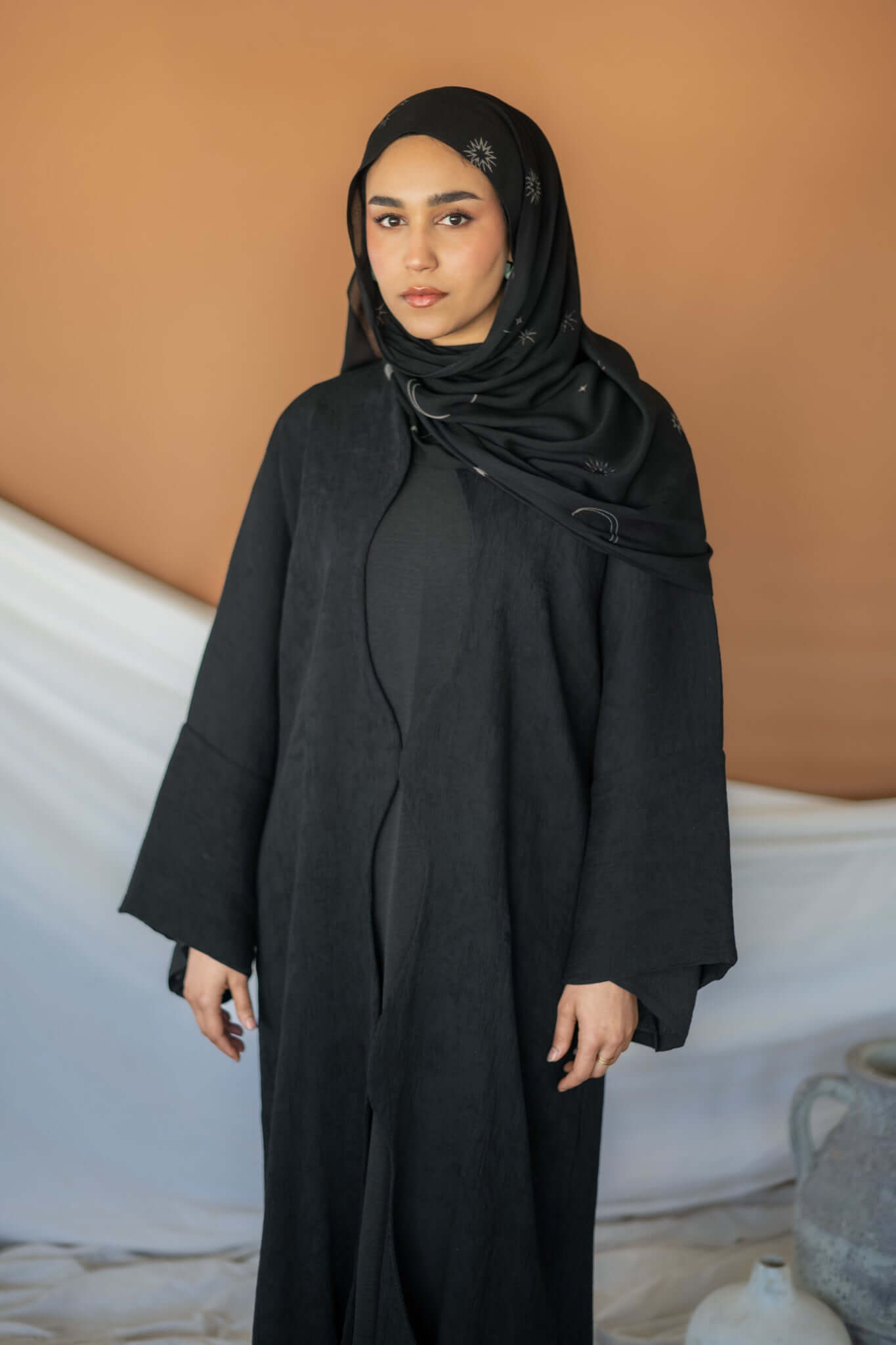 Celestial-themed hijab crafted from soft woven fabric with twinkling lunar details