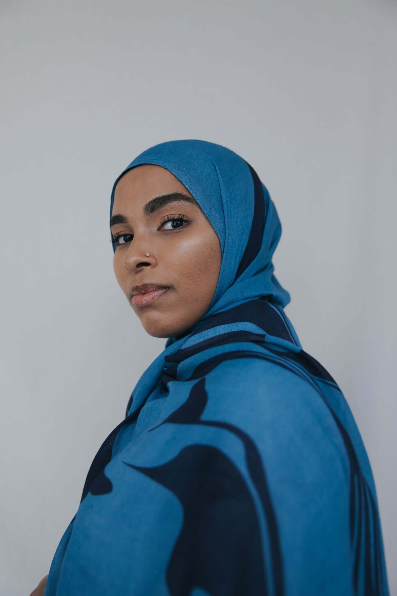 Modal hijab with floating swirl pattern and a fluid, everyday finish