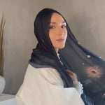 Modal hijab with celestial-inspired artwork, designed for elegance and comfort
