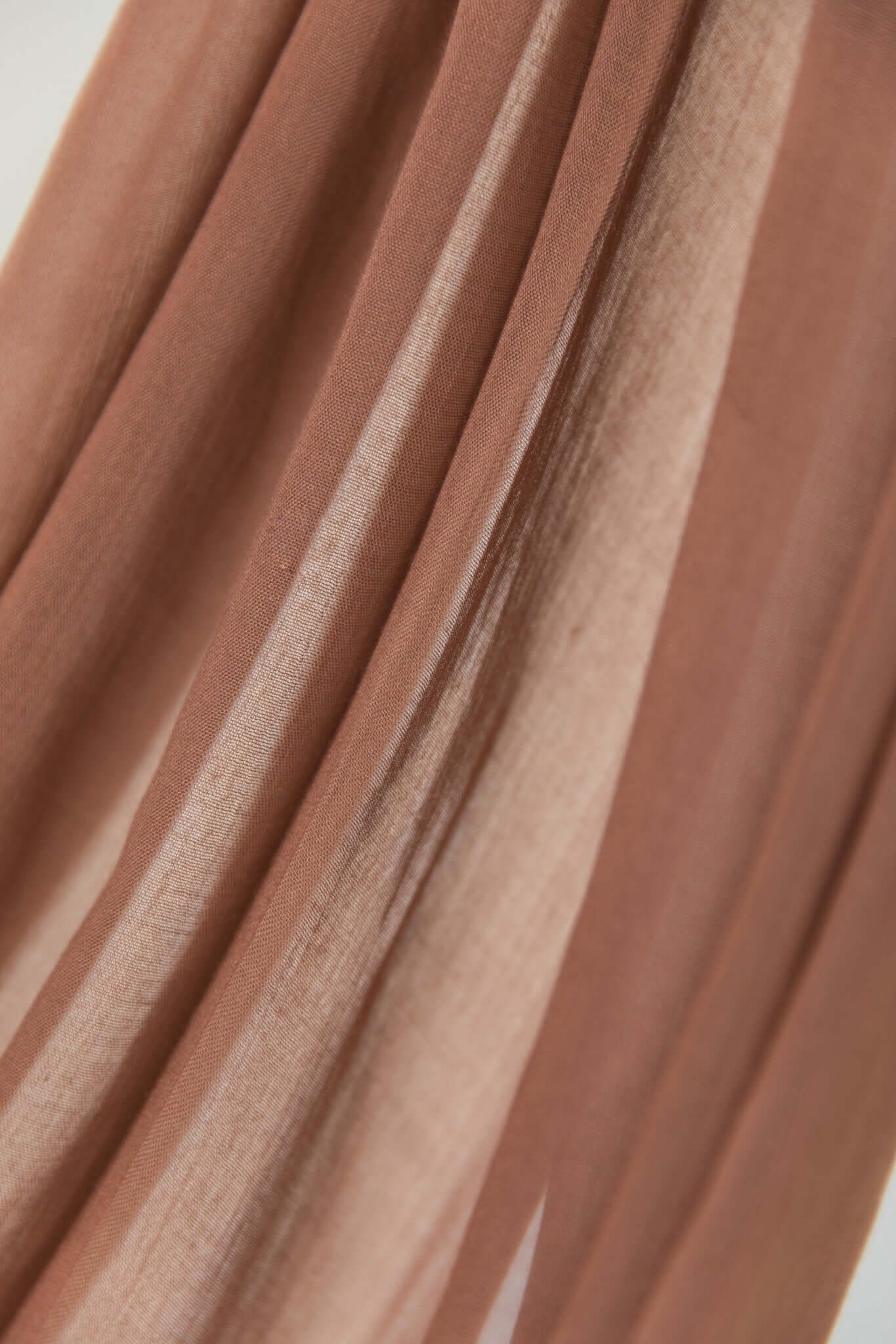 Close up product shot of Toasted Pecan brown hijab.