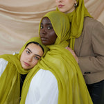 Three Models wearing statement bamboo hijab with a smooth feel and eye-catching finish.