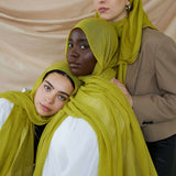 Three Models wearing statement bamboo hijab with a smooth feel and eye-catching finish.