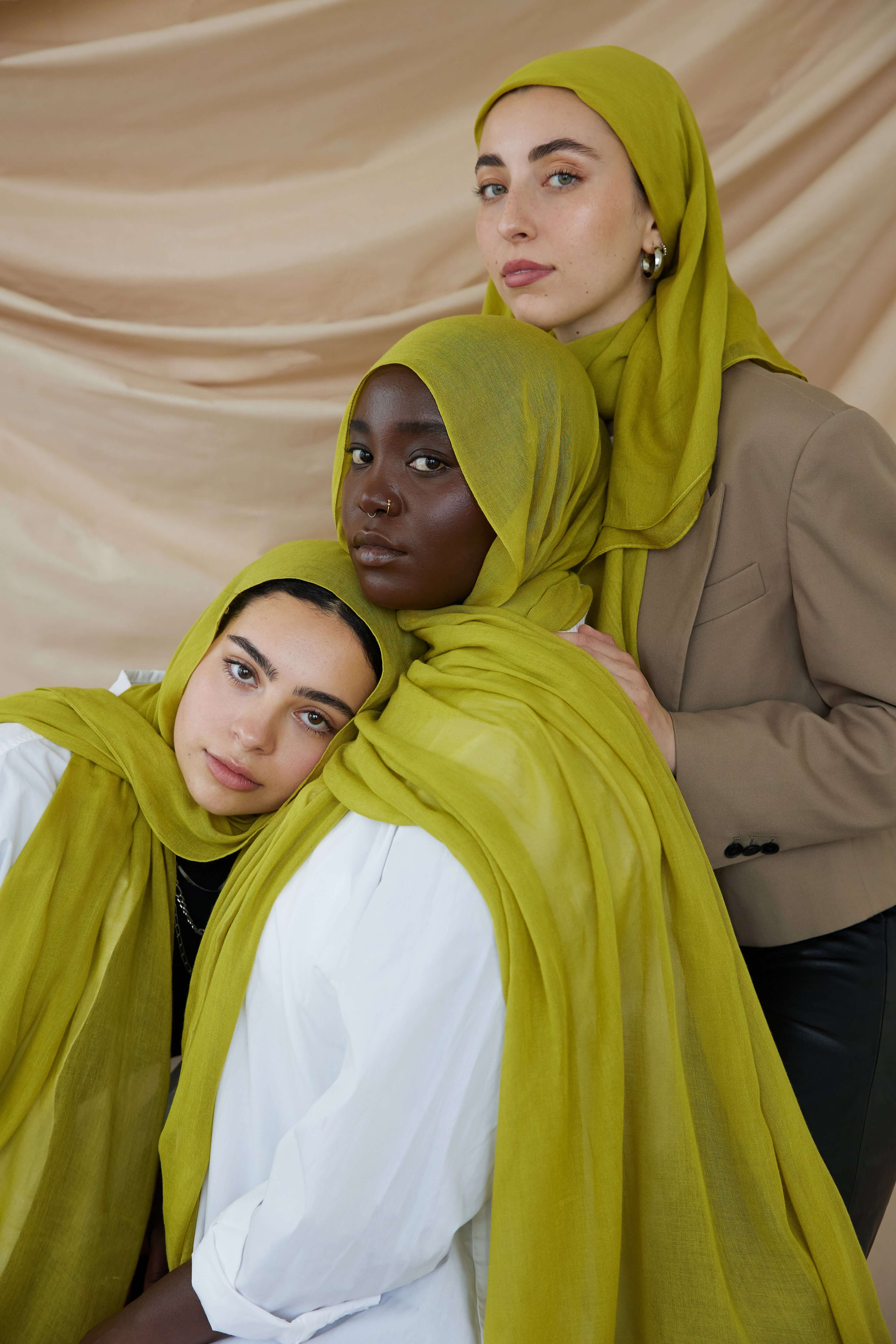 Three Models wearing statement bamboo hijab with a smooth feel and eye-catching finish.