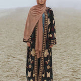 Model wearing a Vela kimono with Aari embroidery.