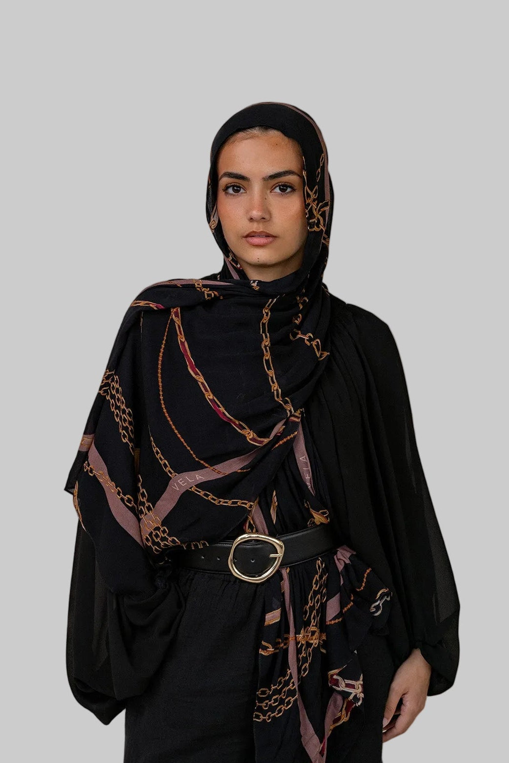 Vintage-inspired scarf featuring an in-house print designed with nostalgic charm.