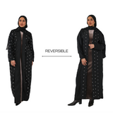 Two views of a reversible black abaya with star patterns on a white background.