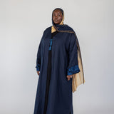 Abaya with detailed stitching on the back, made from a soft modal-linen blend
