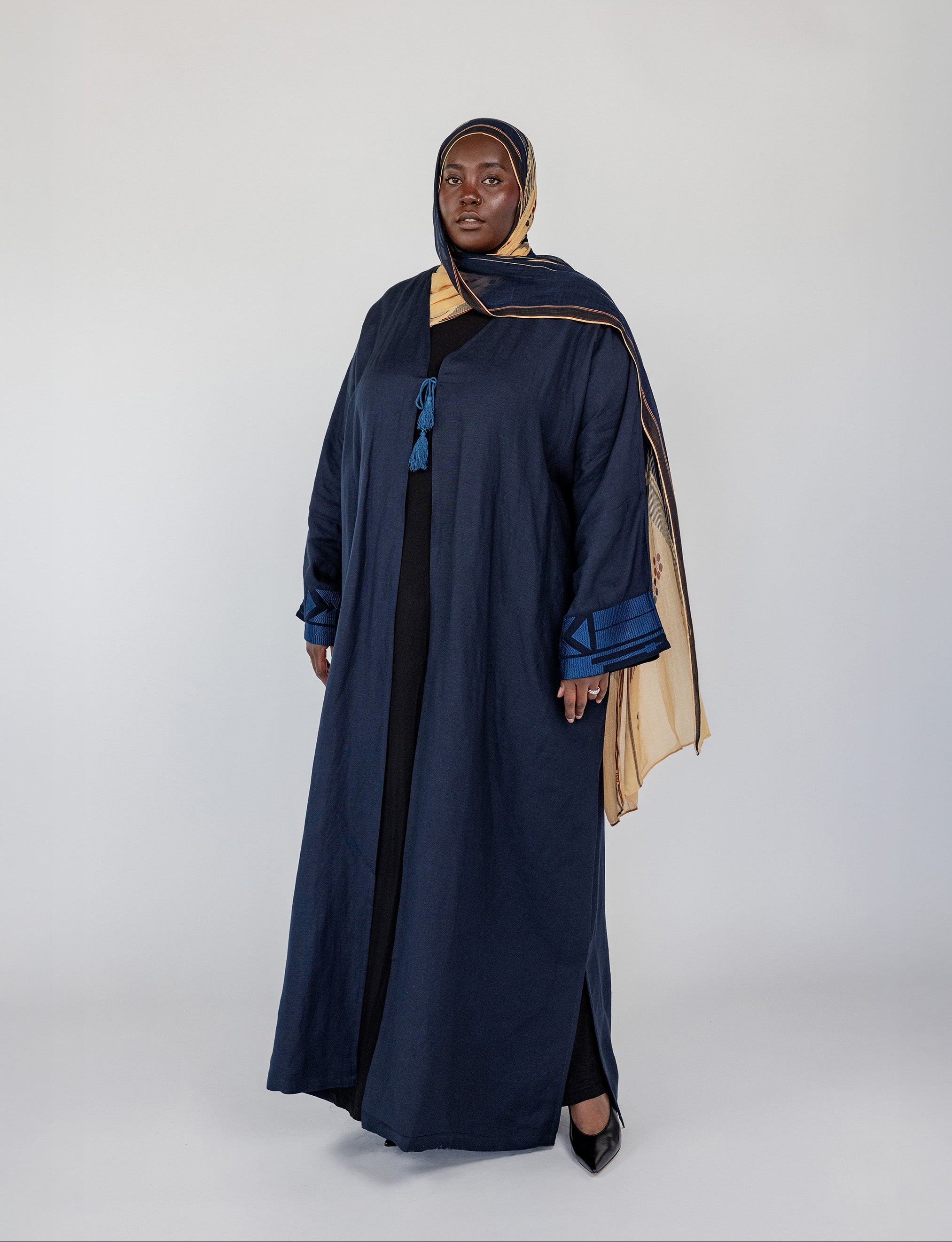 Abaya with detailed stitching on the back, made from a soft modal-linen blend