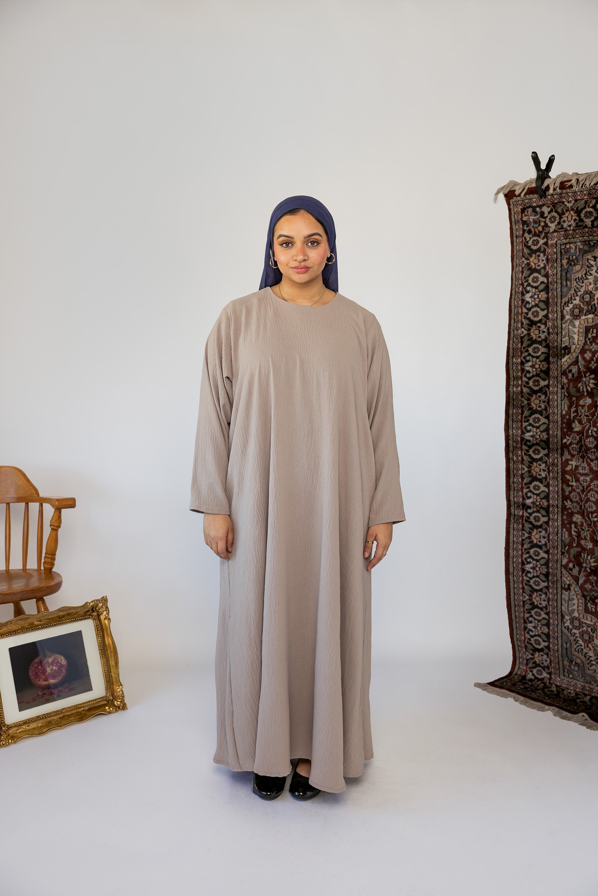 Modest underdress with a clean finish, ideal for layering beneath open abayas.