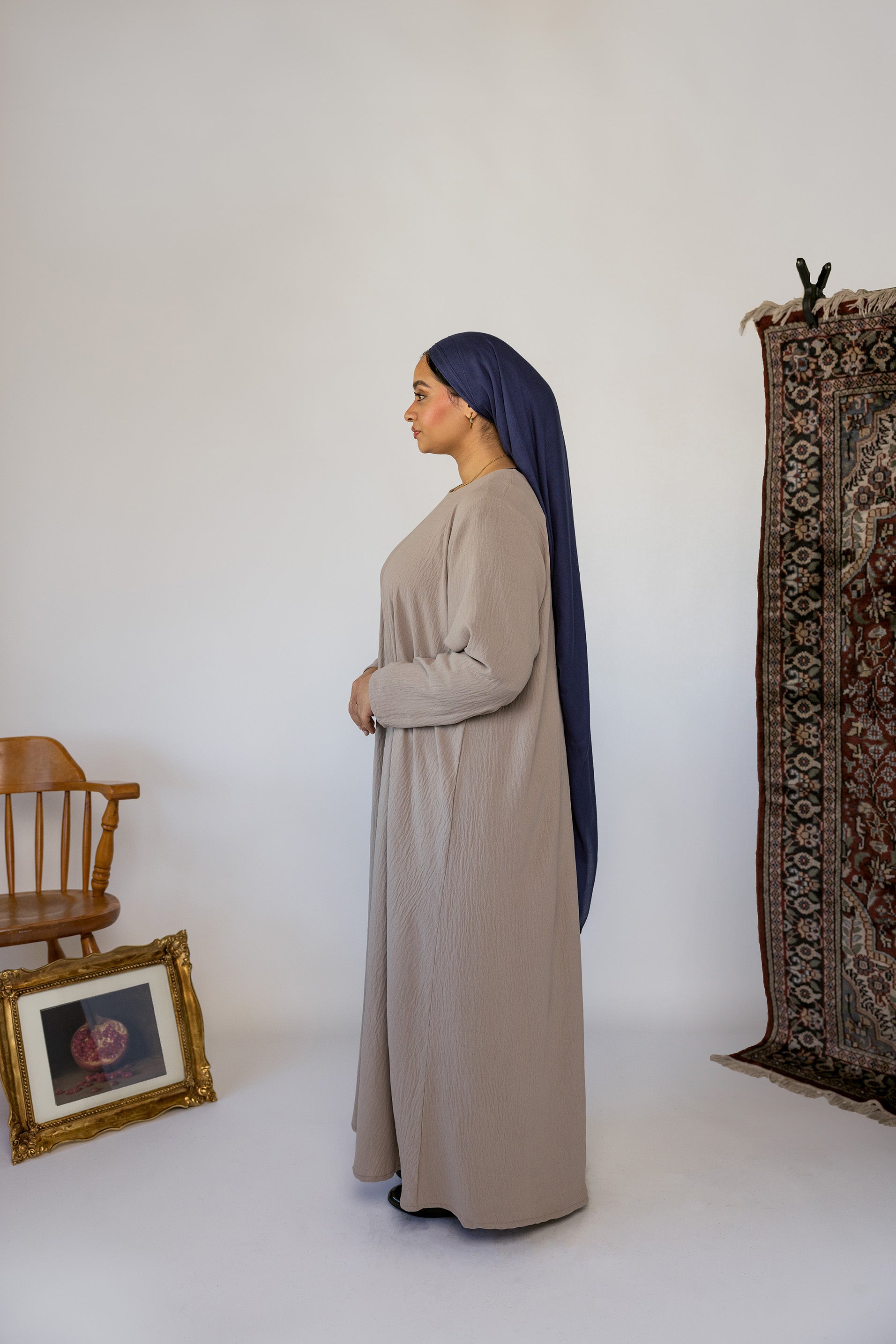 Simple base dress designed for comfort, coverage, and easy styling.