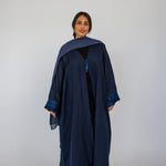 Craft-focused abaya featuring heritage stitching and full-length coverage for modest comfort