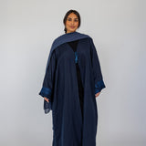 Craft-focused abaya featuring heritage stitching and full-length coverage for modest comfort