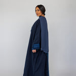 Flowing abaya with rich embroidered design and a relaxed cut in natural-fiber fabric