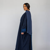 Flowing abaya with rich embroidered design and a relaxed cut in natural-fiber fabric