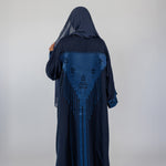 Embroidered-back abaya that merges cultural roots with a versatile, contemporary fit