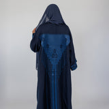 Embroidered-back abaya that merges cultural roots with a versatile, contemporary fit