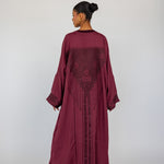 Tradition-inspired abaya with back detailing that reflects Syrian textile artistry
