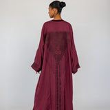 Tradition-inspired abaya with back detailing that reflects Syrian textile artistry