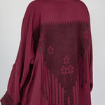 Everyday abaya crafted in a breathable linen blend with elegant embroidery at the back